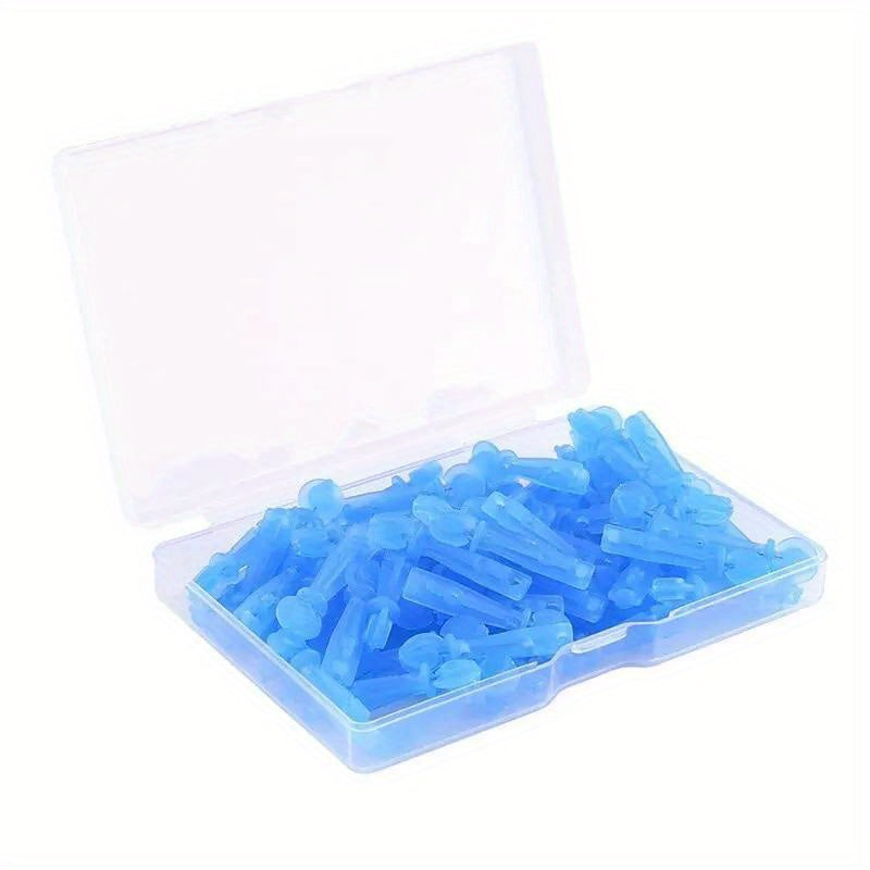 A clear plastic storage case filled with blue, disposable plastic acne and blackhead remover tools.