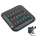 Square infrared heating pad with black synthetic material, red stone inserts, teal wave patterns, and wire controller.
