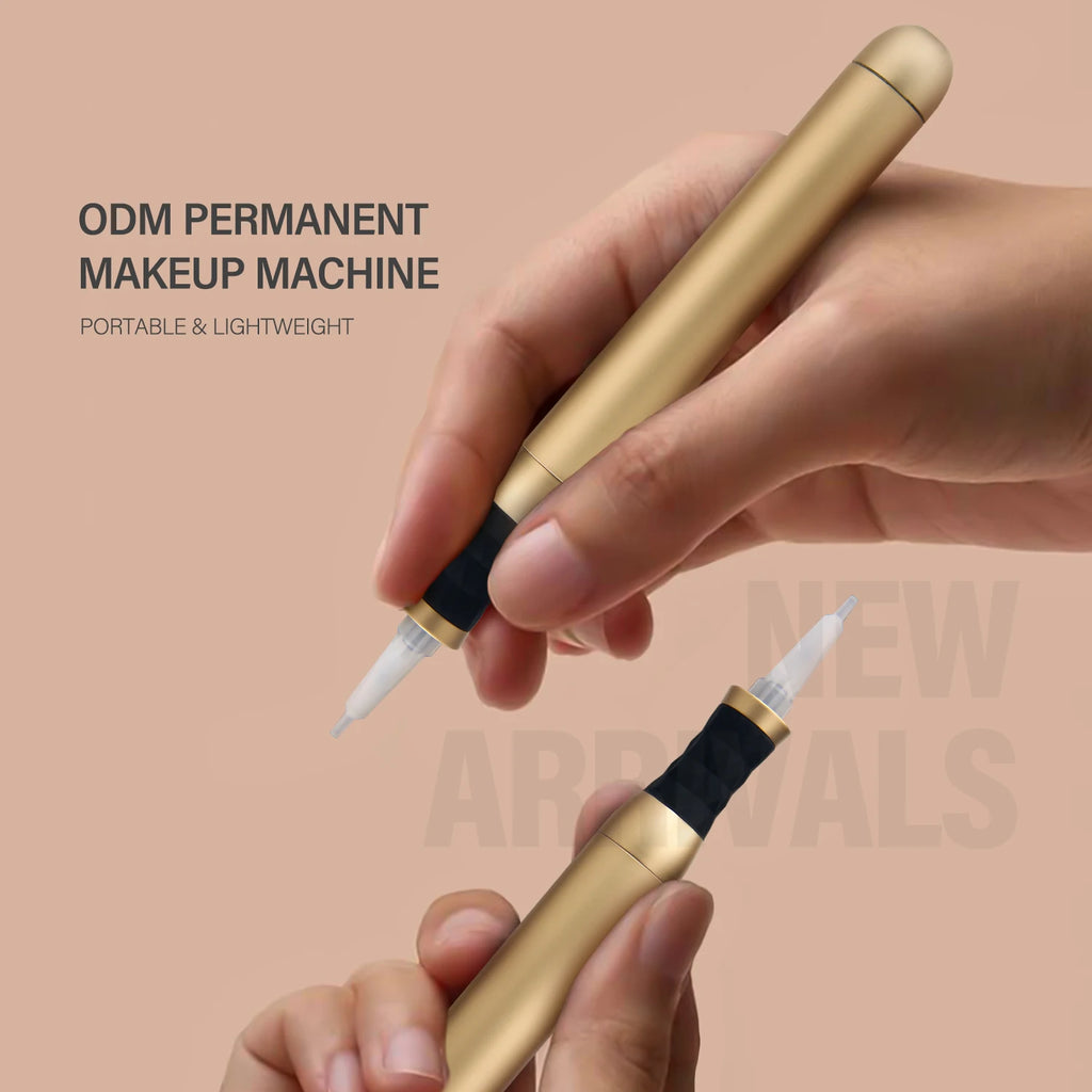 Gold-toned handheld permanent makeup machine with a textured black grip and small white tip for precision tattooing.