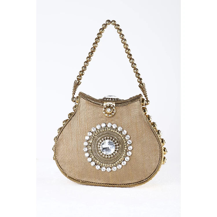 Gold designer handbag with crystal embellishments, beaded handle, and kiss-lock closure in a luxury silk style.