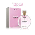 Roxelis Charme Citron 50ml round pheromone perfume spray for women. Elegant floral citrus scent in a glass bottle.