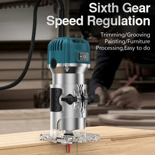 Teal and silver electric wood router trimmer on a wooden board with transparent base