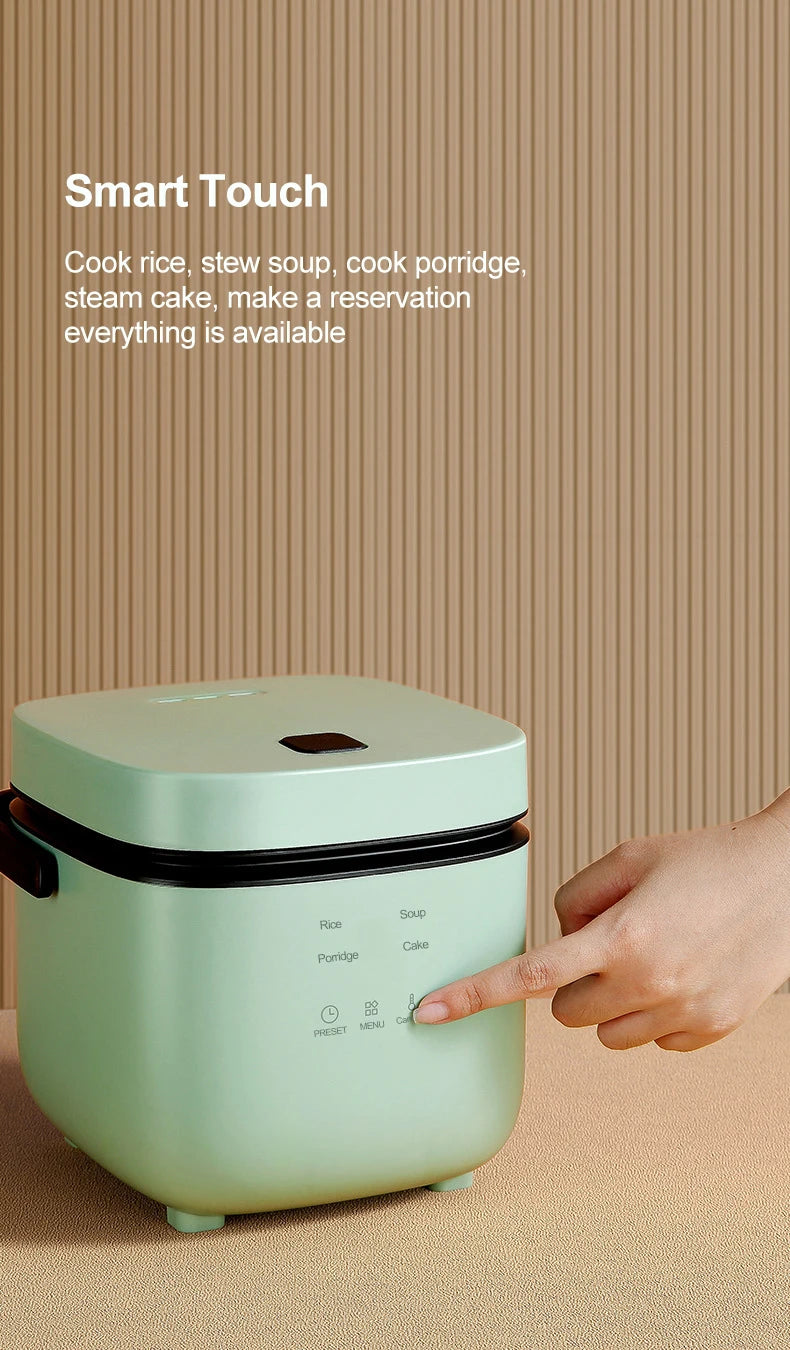 Mini electric rice cooker, mint green with top control area and black trim, manual touch buttons
