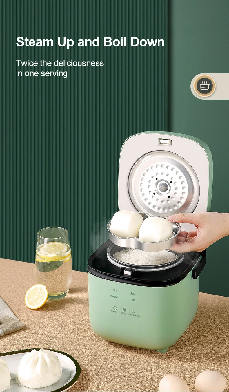Mint-green rice cooker with steam vent, lid open for cooking and warming