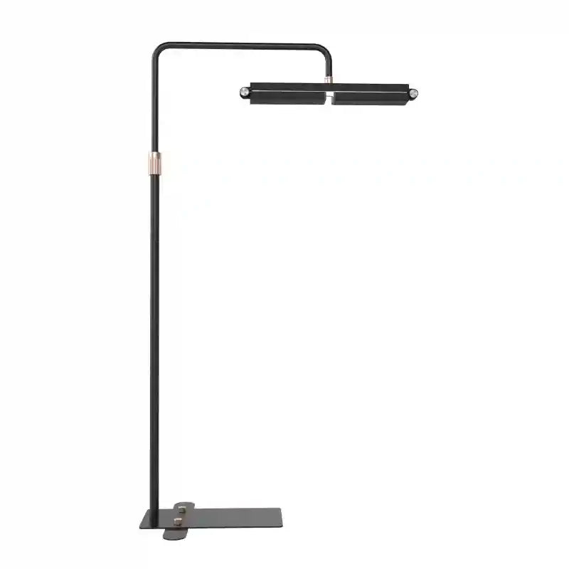Matte black metal floor reading lamp with an adjustable rectangular head, standing on a slim rectangular base.
