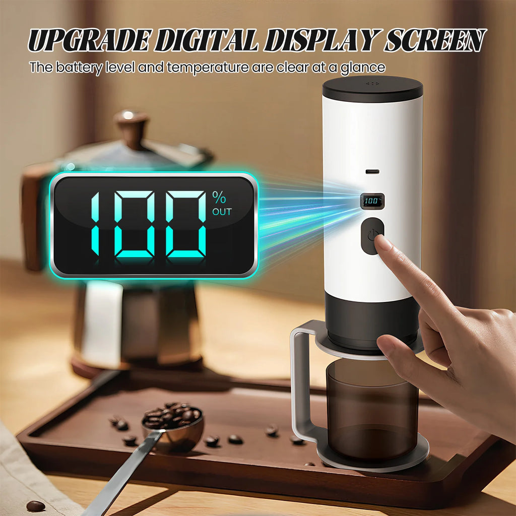 White portable coffee maker with digital display screen showing battery percentage and power button.