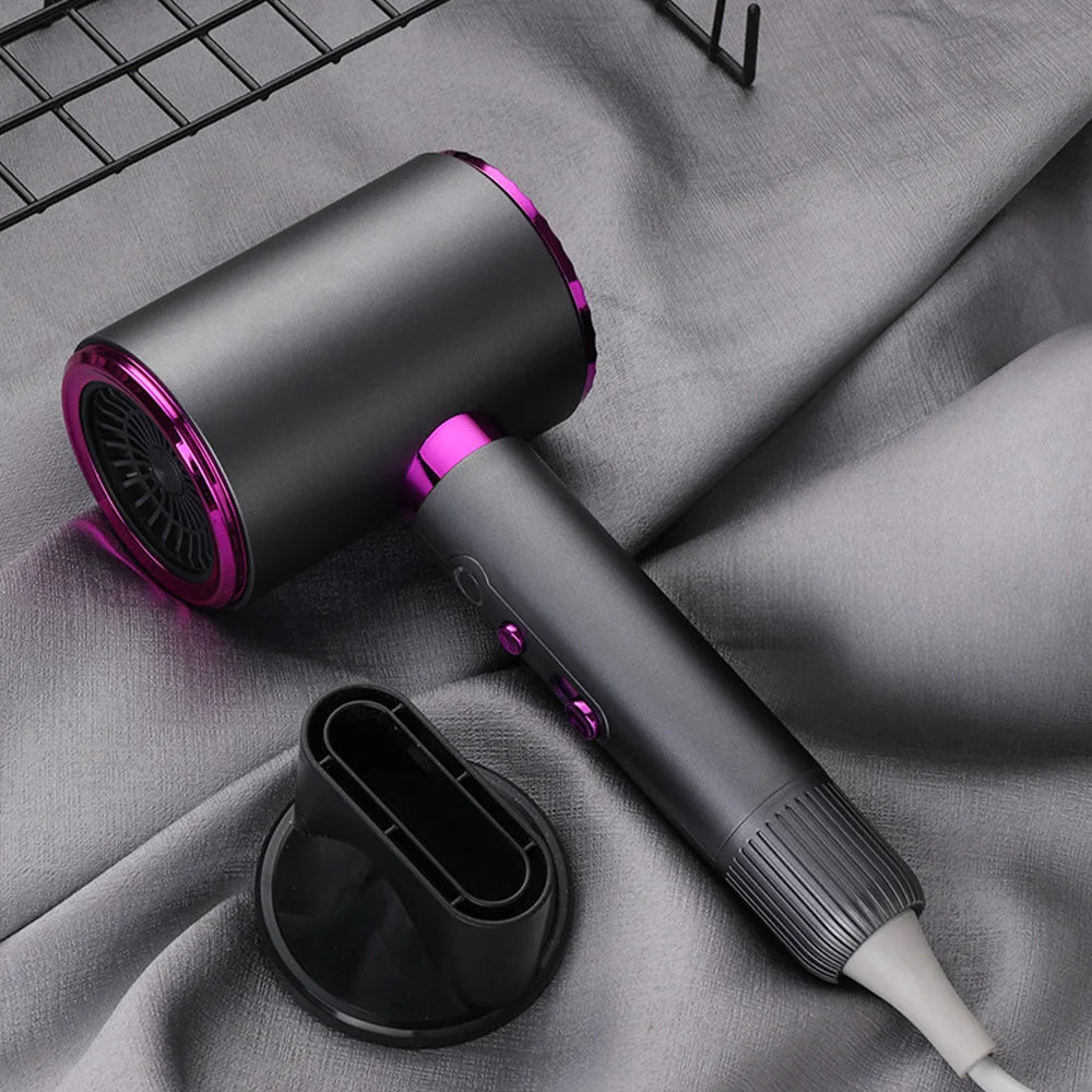 2400W high-speed black and purple ionic hair dryer with styling nozzle for professional salon-quality quick drying.