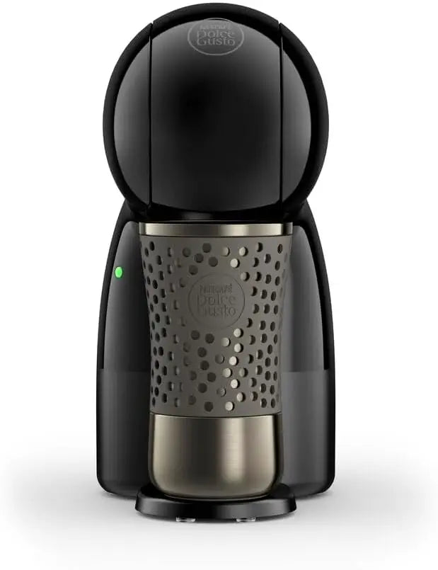 Black Nescafe Dolce Gusto capsule coffee machine with sleek modern design and patterned metallic finish cup base.