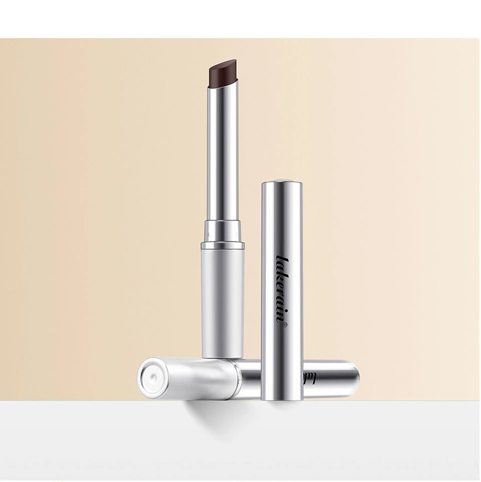 Lakerain moisturizing honey lip balm in a sleek silver tube with a dark brown nourishing lipstick core.