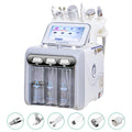 6-in-1 hydro dermabrasion facial machine with touch screen, water tanks, and spa skin rejuvenation treatment probes.