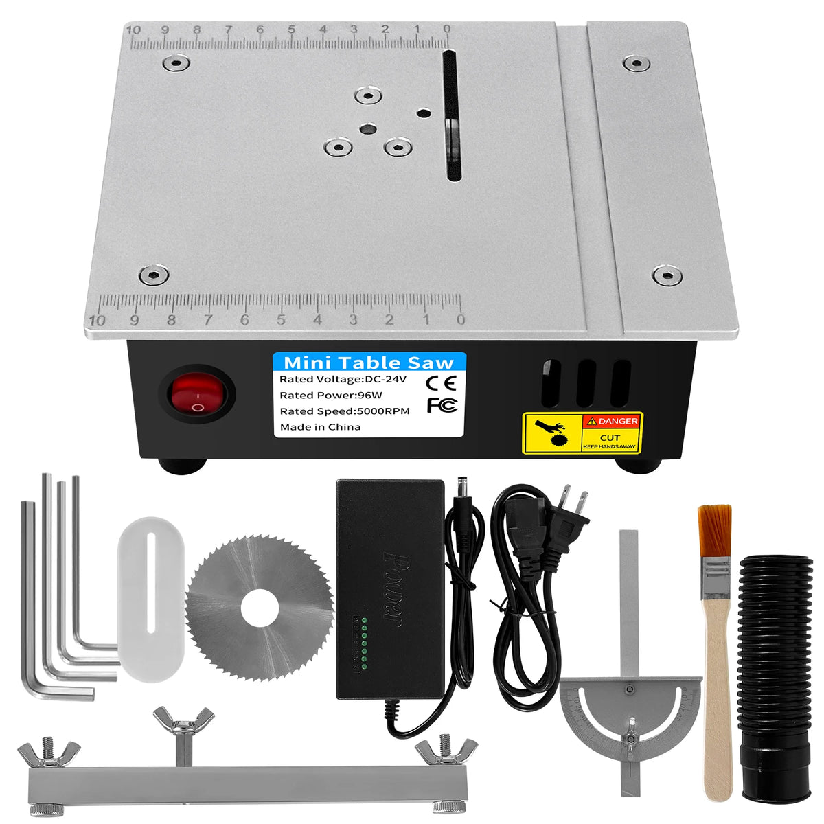Front view of black mini table saw with red power switch and included blade accessories
