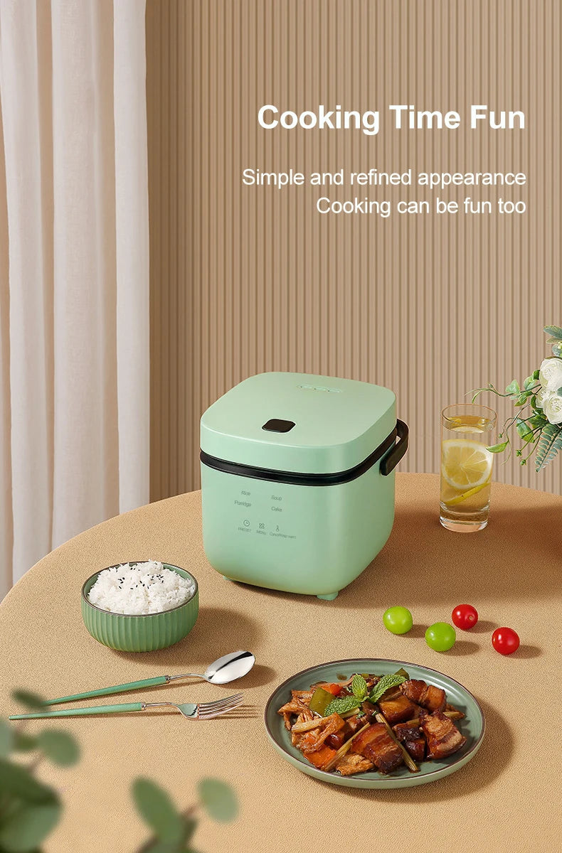 Mint-green countertop rice cooker with lid closed, compact shape for meal prep