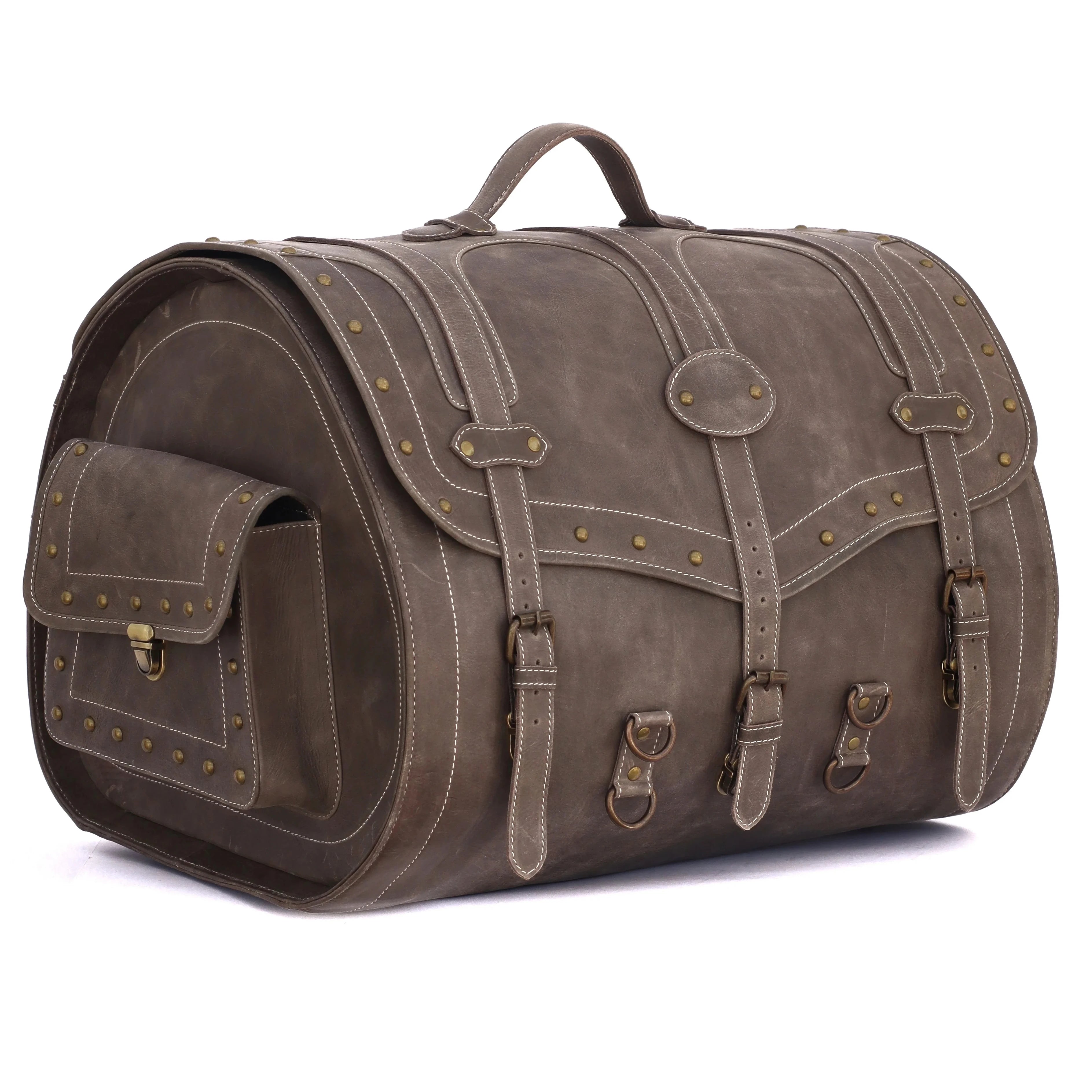 Vintage-style brown leather trunk bag with brass stud detailing, buckle straps, and large capacity for travel or fitness.