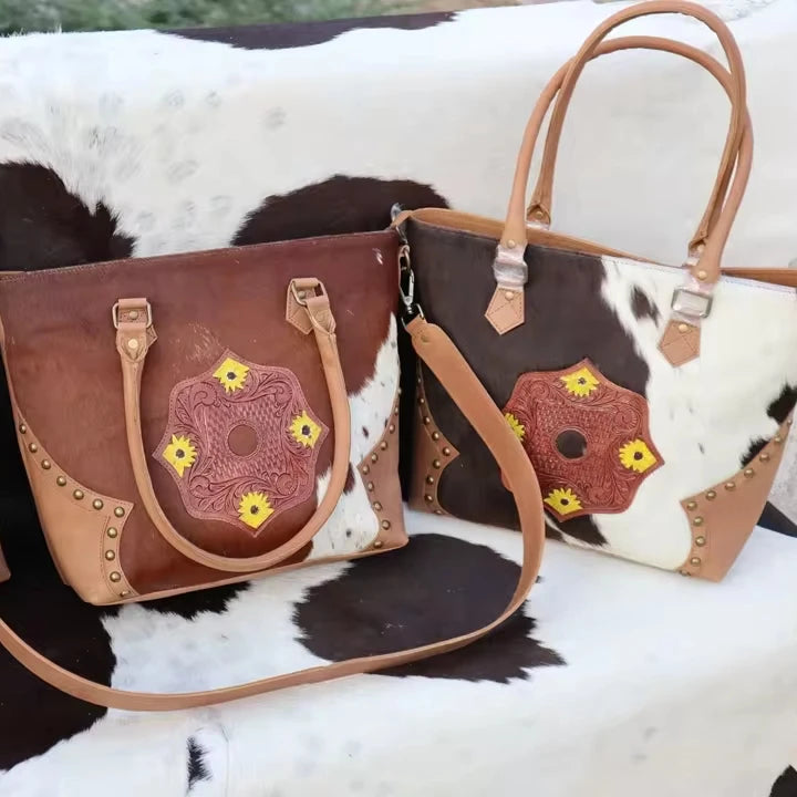 RABADA Western cowhide leather handbags with tooled floral patches, zipper closure, studs, and dual carry straps.