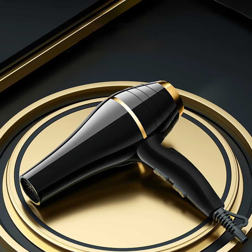 Professional 1800W black and gold ionic hair dryer for fast drying, featuring heat settings and a sleek, modern design.