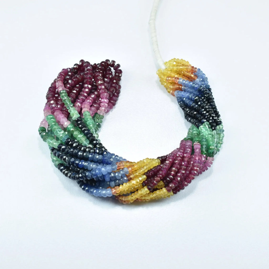 Multicolor faceted rondelle bead strand in a curled loop: maroon, green, blue, yellow