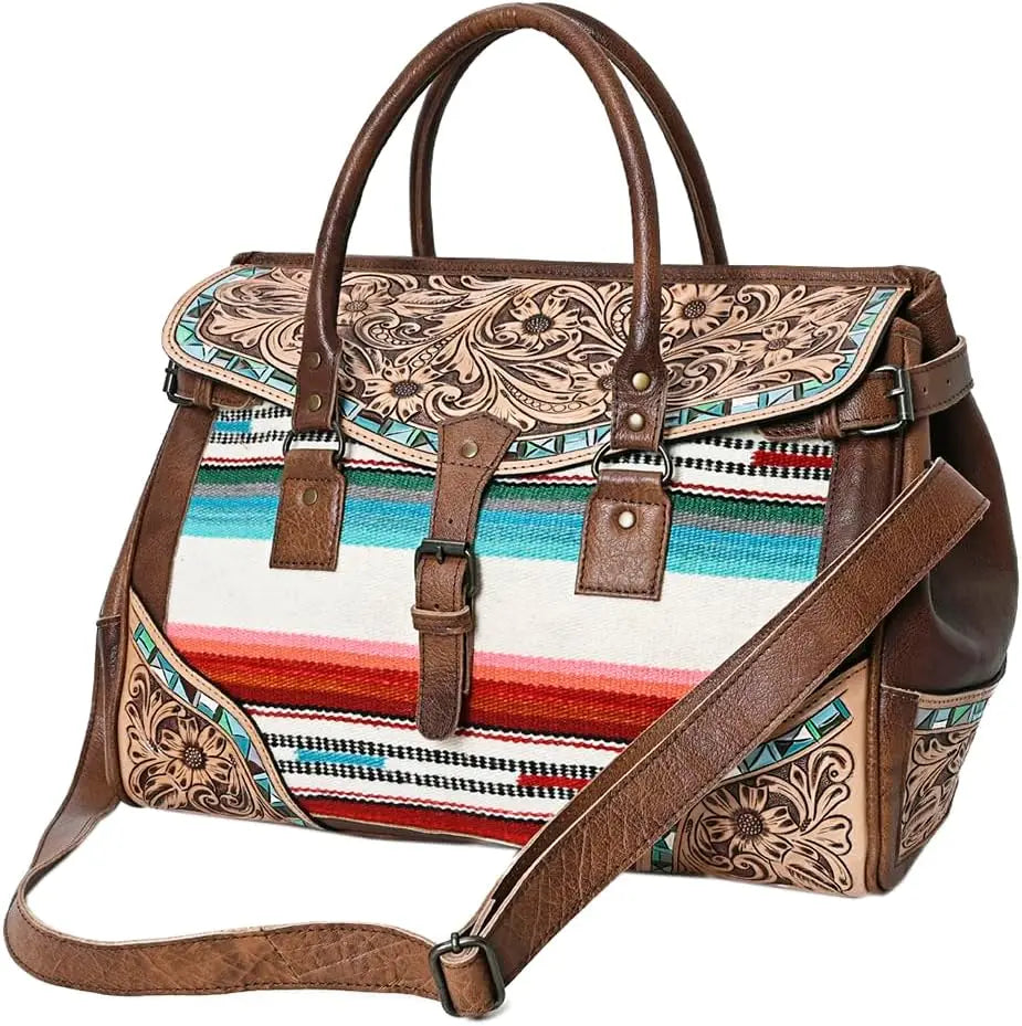 Handwoven western tooled leather duffel bag with colorful striped fabric, brown leather straps, and buckle closure.