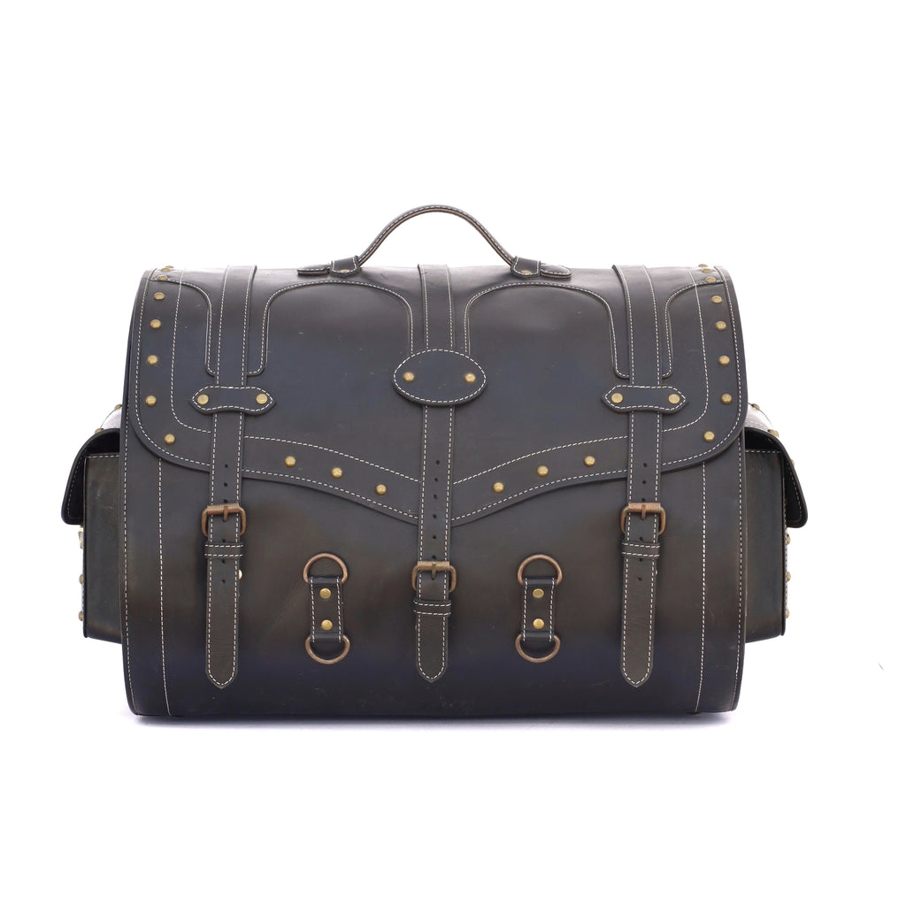 Large black leather trunk with vintage brass studs, buckle straps, and side pockets for travel and fitness luggage.