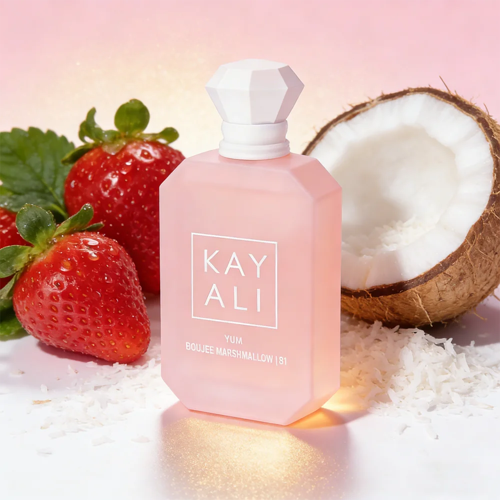KAYALI Yum Boujee Marshmallow 81 EDP. Pink bottle with strawberries and coconut. Warm gourmand fragrance for women.