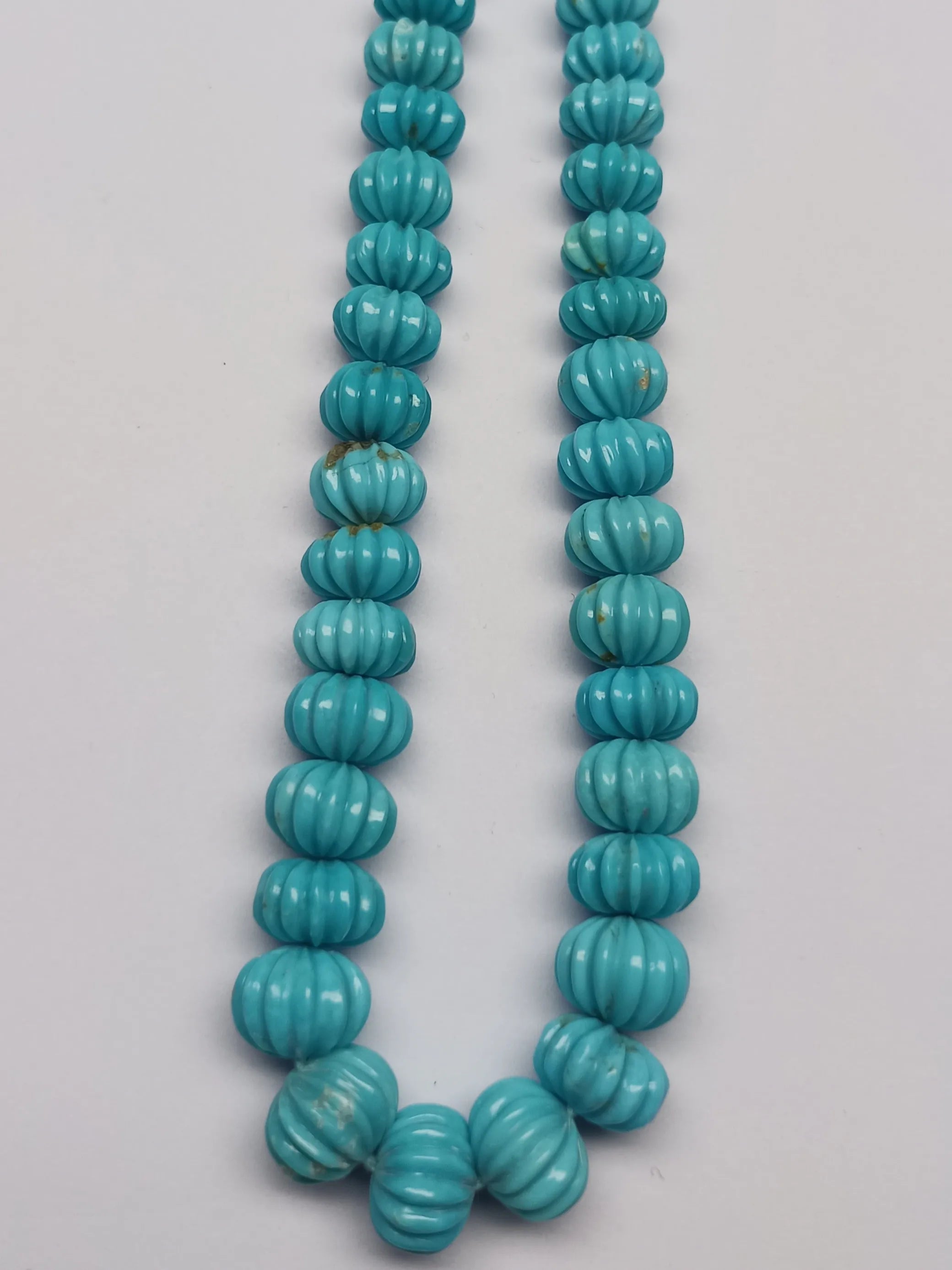Blue turquoise carved pumpkin-shaped beads strand necklace with rounded stacked beads