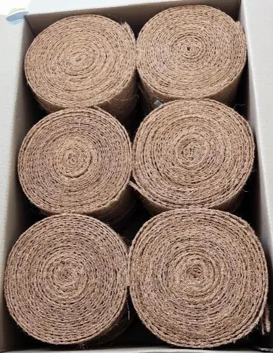 Brown coir sheet tape rolls, tightly wound and packed in a box