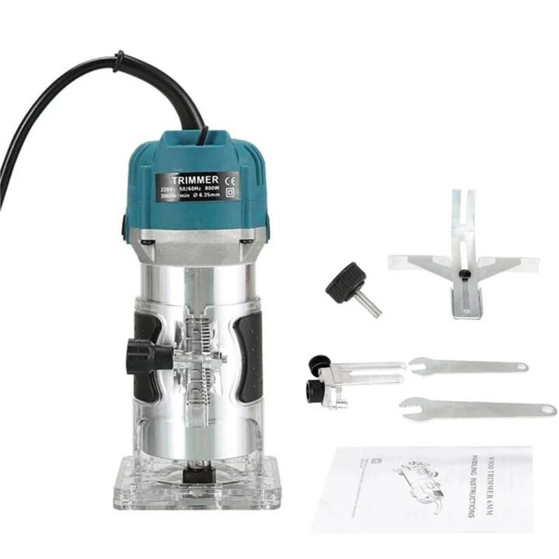 Teal wood trimming router with clear base, black side knob, and included accessories