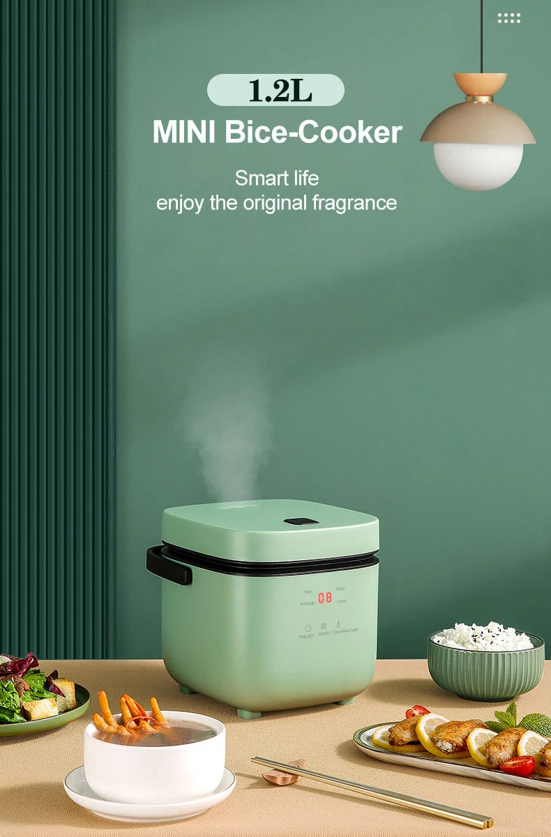 Mini electric rice cooker, 1.2L teal unit with closed lid on kitchen table