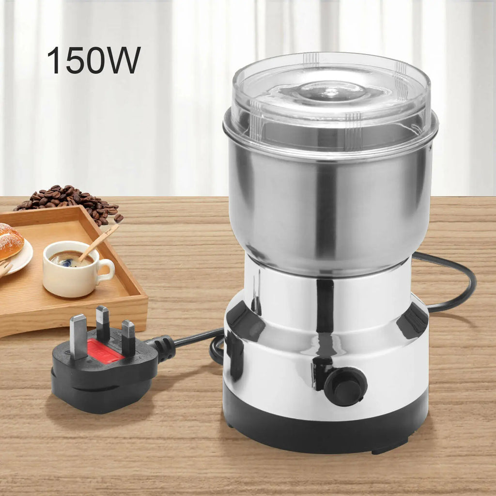 150W stainless steel electric coffee and spice bean grinder with a clear lid and UK plug on a wooden table.