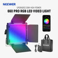 660 PRO RGB LED video light with adjustable metal barn doors, power adapter, phone app control, and carrying bag.