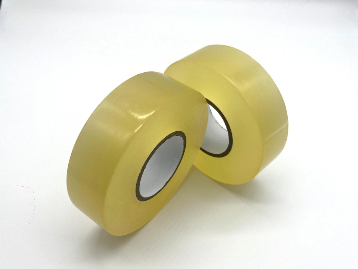 Gold hockey grip tape rolls with center cores