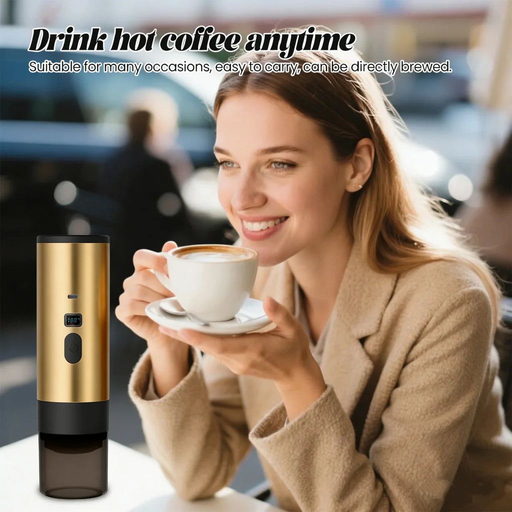 Portable gold electric coffee maker with digital temperature display and black base for on-the-go brewing.