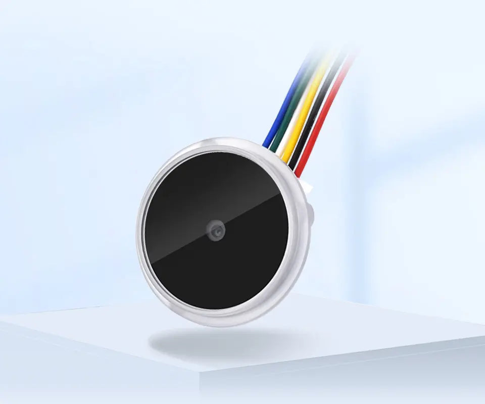 Round 2D barcode scanner with black lens and rainbow-colored cable, angled view