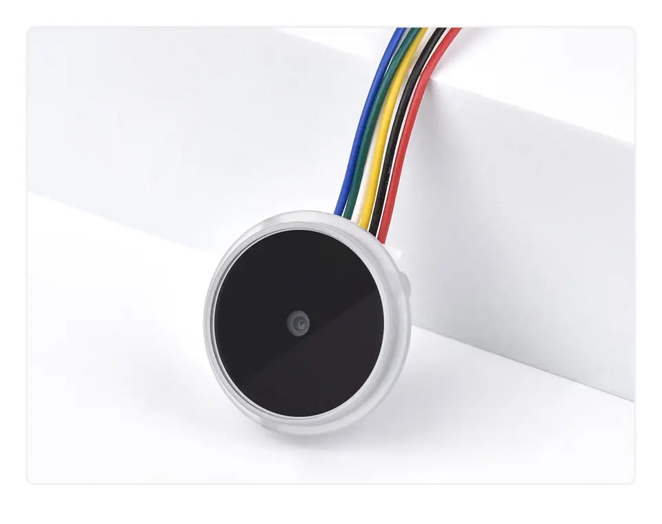 Round 2D barcode/QR scanner module with black lens window and three-color wire leads