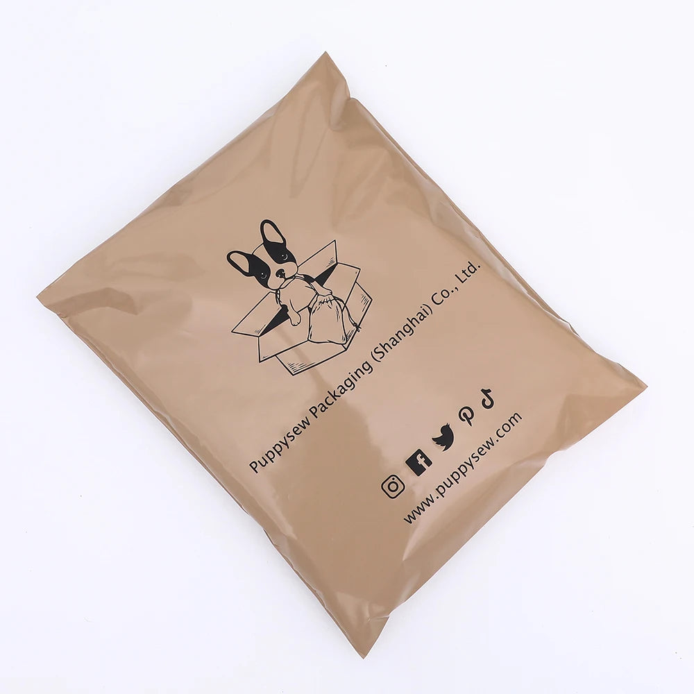 Brown poly mailer shipping bag with printed logo, social icons, and website