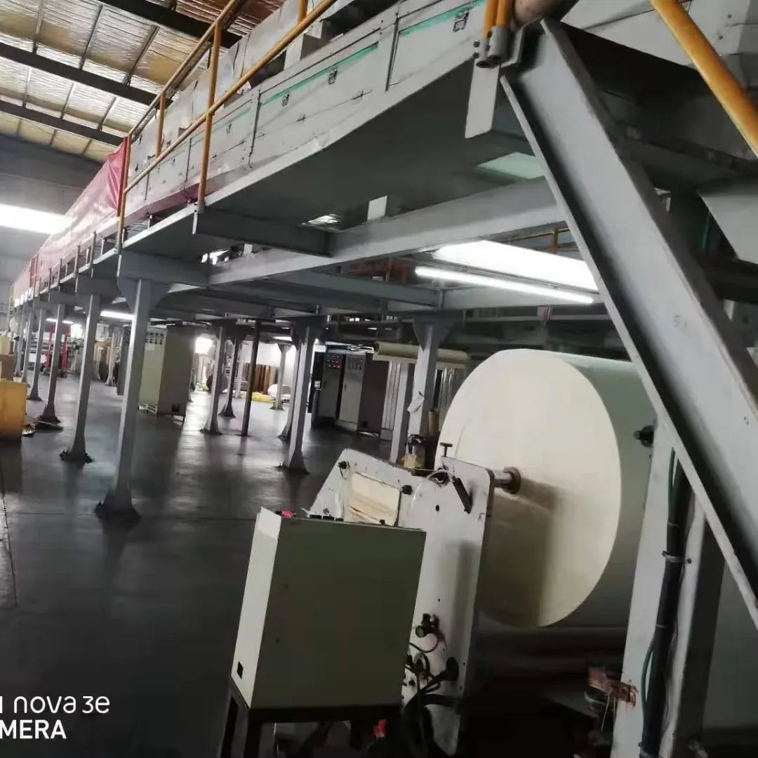 Large masking tape jumbo roll mounted on industrial production line