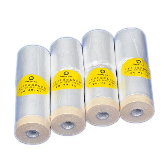 Four white masking film rolls with tan tape bands and cardboard cores