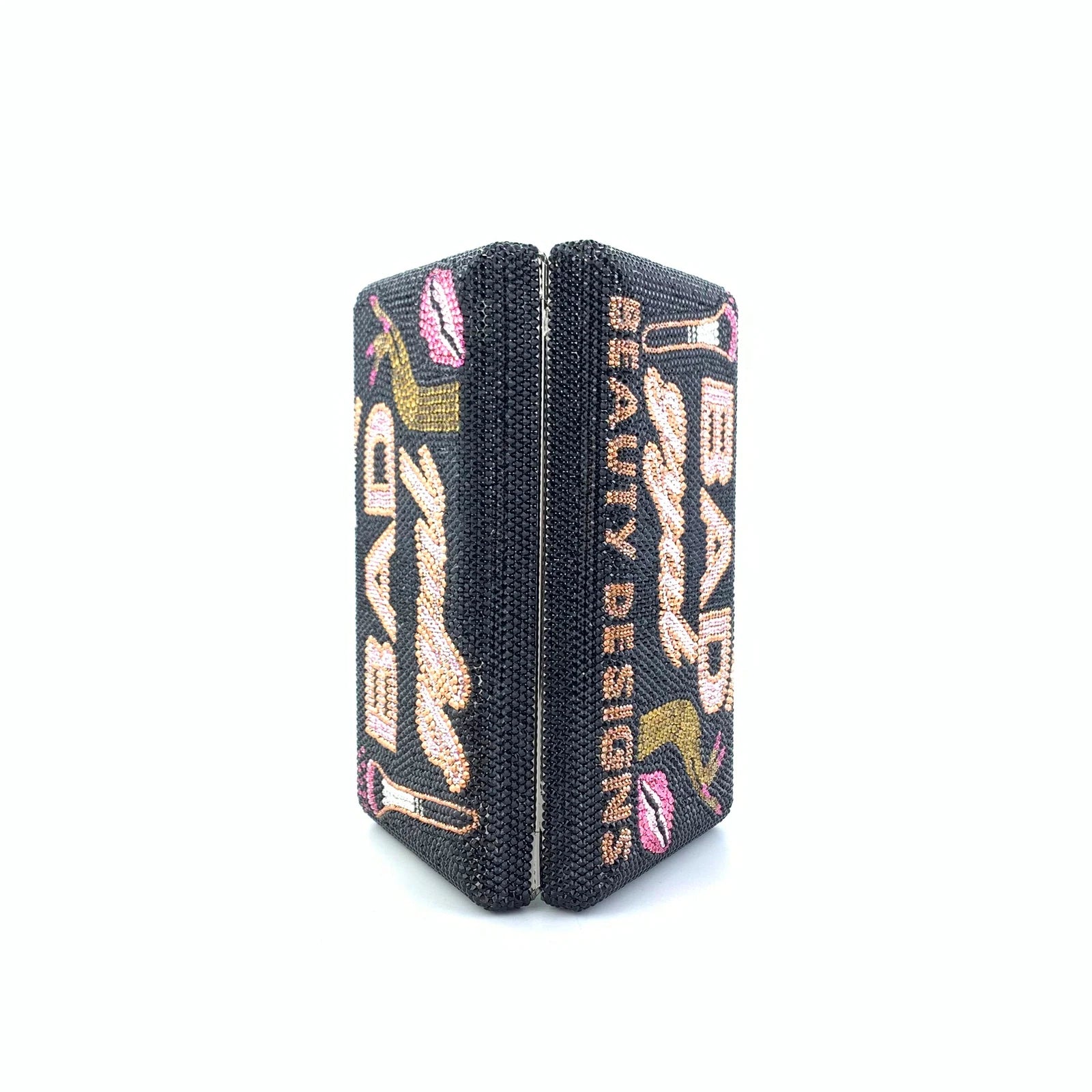 Black crystal-encrusted designer clutch featuring multicolored "BAD BEAUTY DESIGNS" rhinestone graphics and lips.