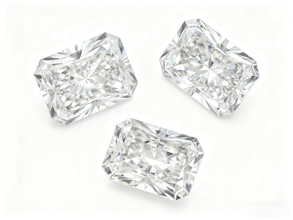 Three lab-grown radiant-cut diamonds arranged for viewing
