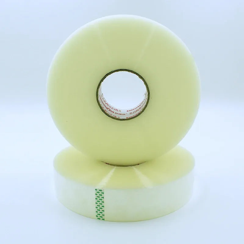 Light green tape roll with exposed inner core ring and printed label
