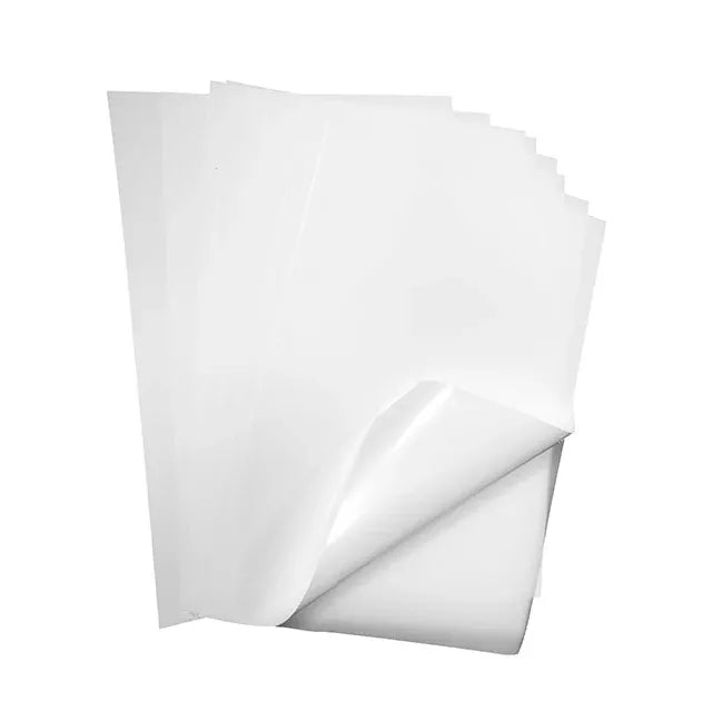 Matte white vinyl sticker paper sheets, stacked for printing, matte finish