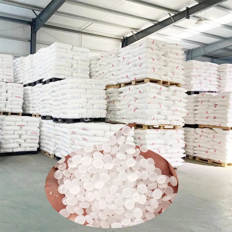 Warehouse pallet stacks of white poly self-seal shipping mailers in bulk