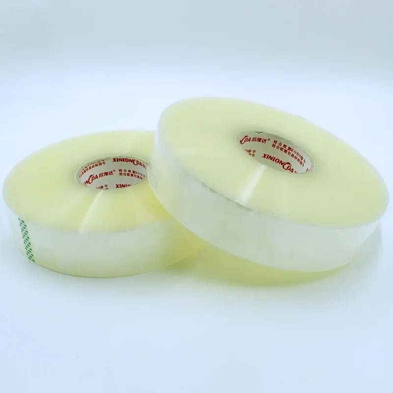 Light green translucent tape rolls with printed cores, pressure-sensitive sealing tape