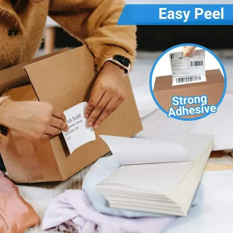 Thermal shipping labels applied to cardboard boxes with strong adhesive