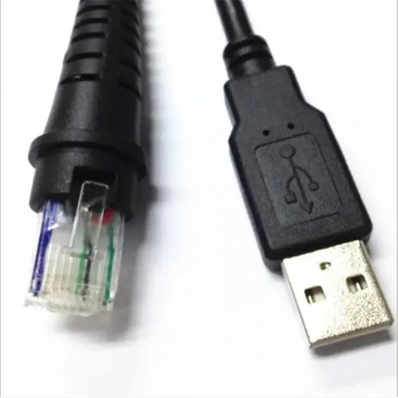Close-up of clear RJ45 plug and black USB connector on barcode scanner cable