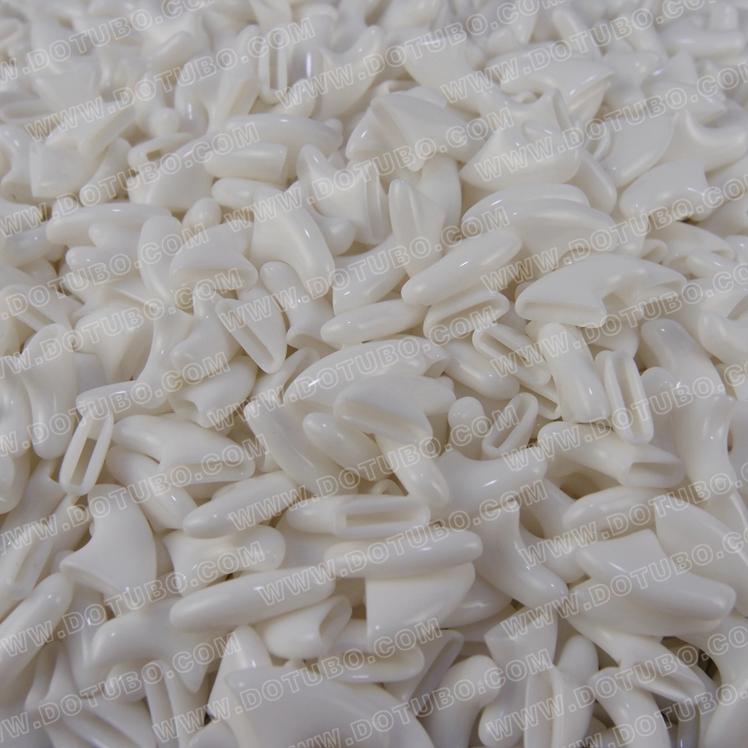 White soft cat nail caps for claw protection, 20-pack kit with adhesive for safe, scratch-free pet grooming.