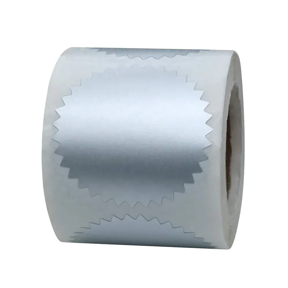 Silver metallic circular wafer seal sticker roll with serrated edges