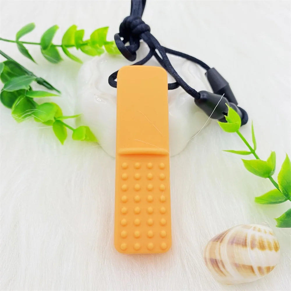 Orange silicone baby teething toy on a necklace for soothing teething pain.