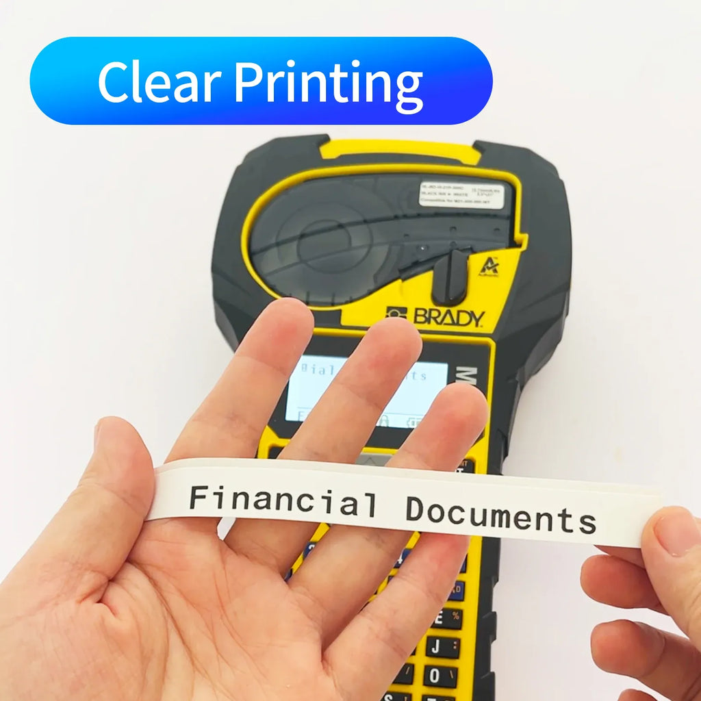 Black label printer cartridge with white label strip being applied in clear print mode