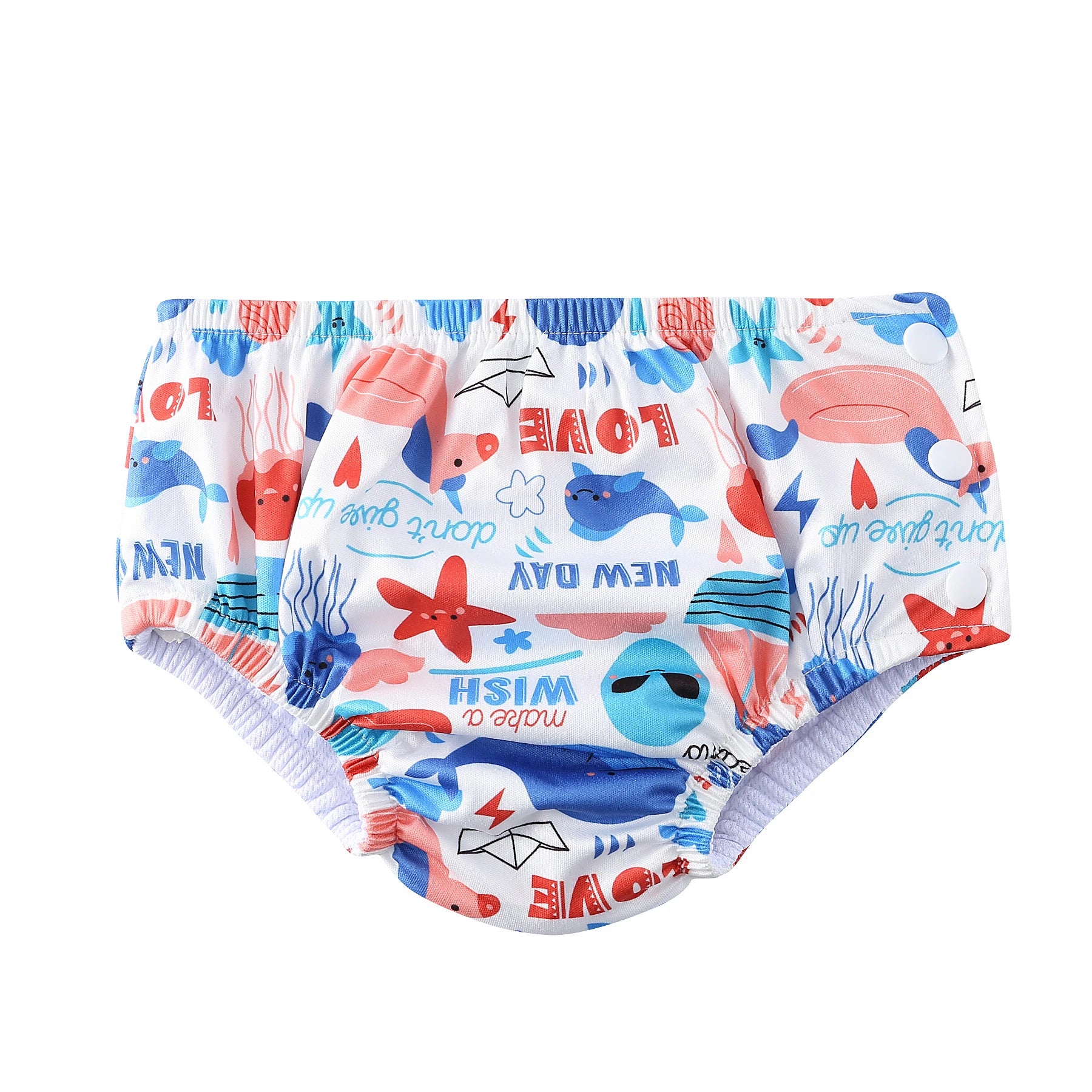 Reusable baby swim diaper with colorful ocean print featuring whales and starfish, side snaps, waterproof design.