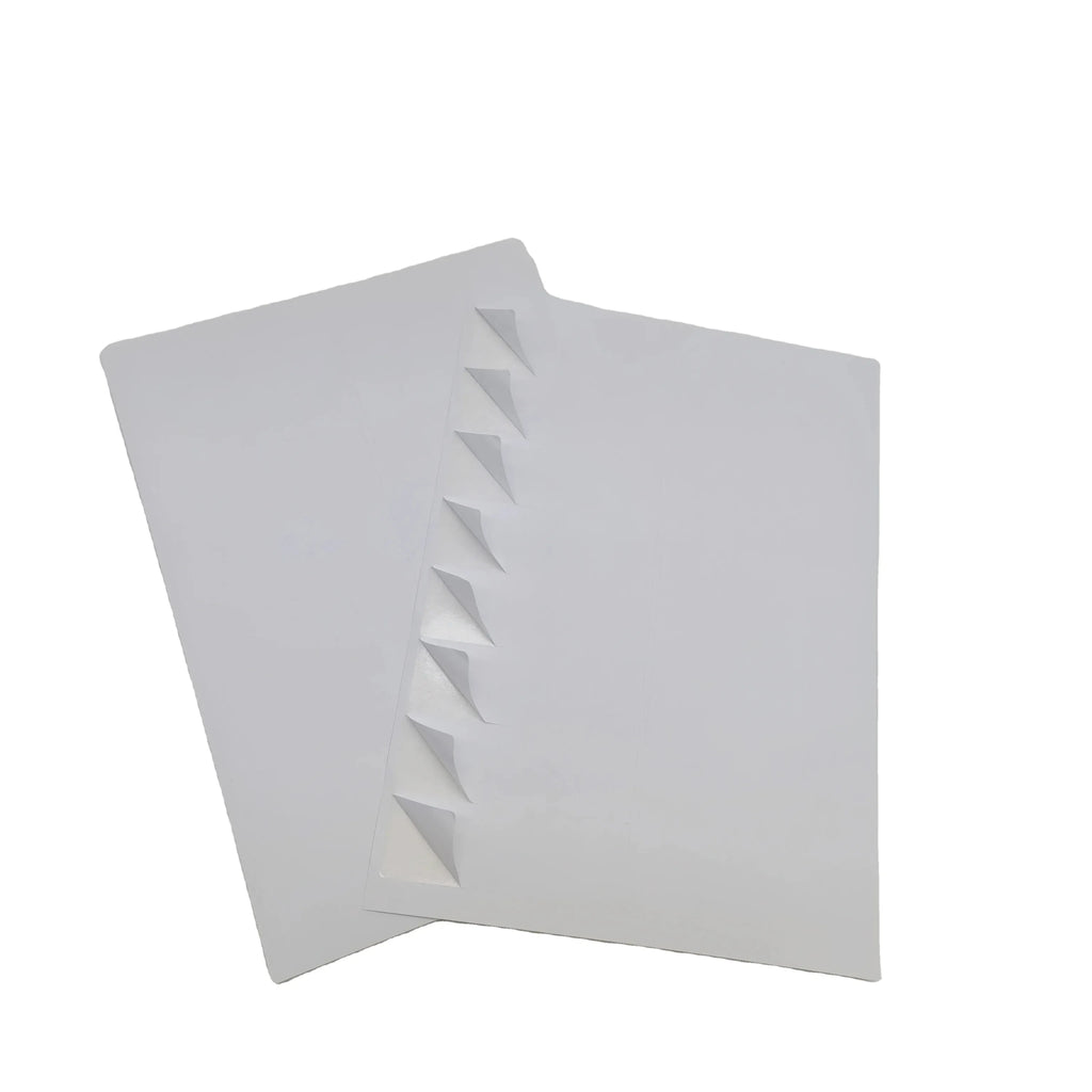 White A4 printable vinyl sticker sheets, two-sheet stack with visible edges